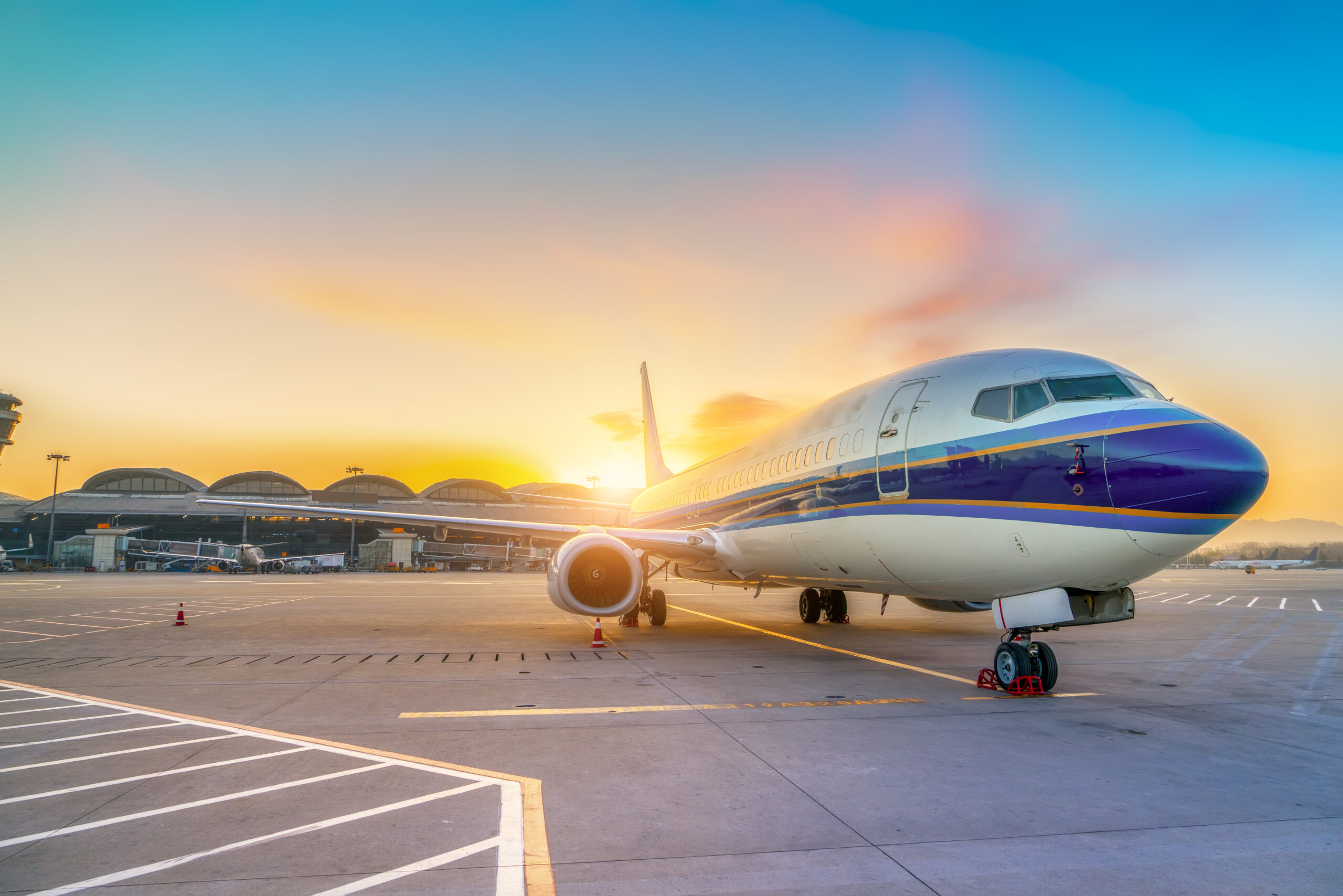 Airliner on airport runway and apron